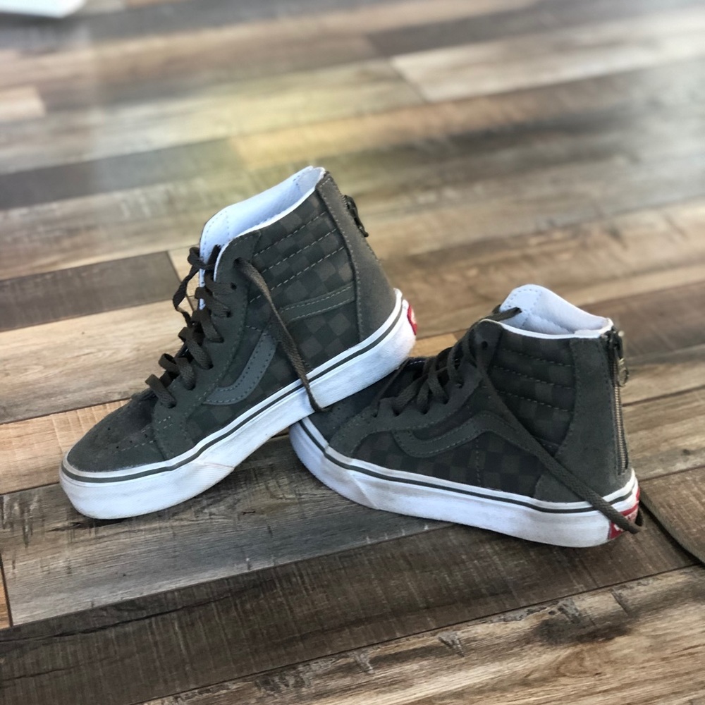 Vans army green checkered high tops.